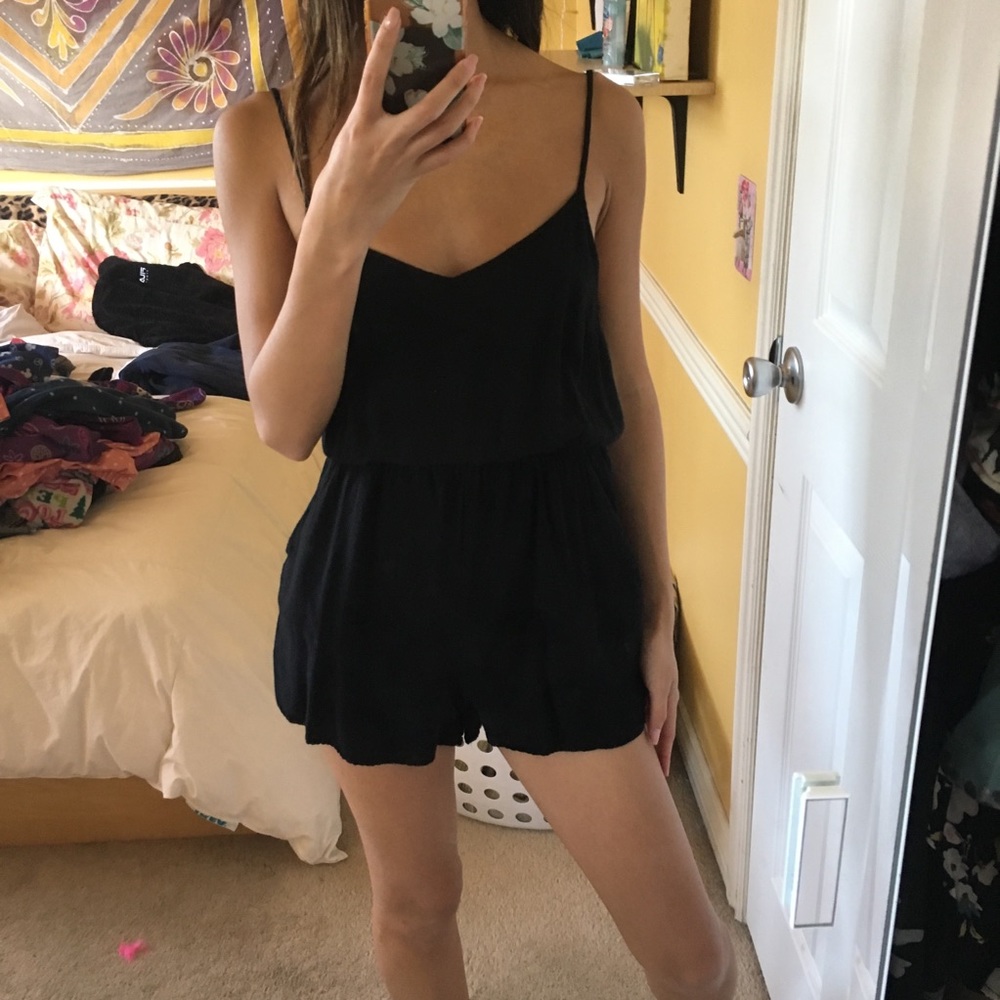 Black cross-cut back romper